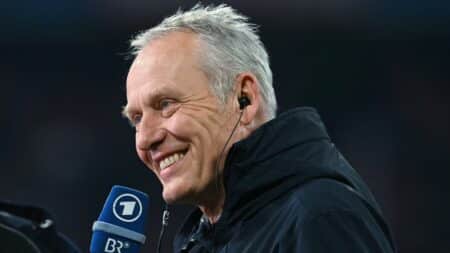 Bild: Freiburgs Trainer Christian Streich voller Vorfreude (© AFP/SID/CHRISTOF STACHE)